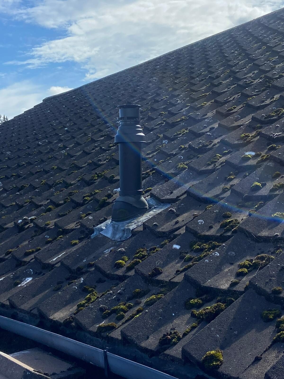 New boiler flue terminal correctly installed through a pitched roof — Gas Safe compliant flue work for a landlord CP12 by On-Tap Plumbing & Heating